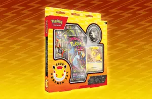 Pokemon training cards in a yellow package, in front of an orange background.