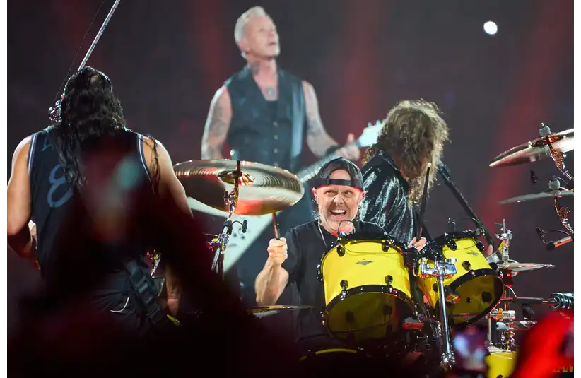 Metallica drummer Lars Ulrich looks to bassist Robert Trujillo as they perform Creeping Death from their 1984 album Ride The Lightning at State Farm Stadium in Glendale on Friday, Sept. 1, 2023.