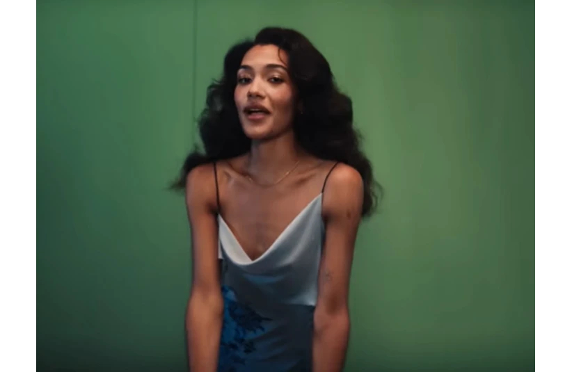 Olivia Dean, pictured singing "Man I Need," will be a headliner at BRITs Week 2026.