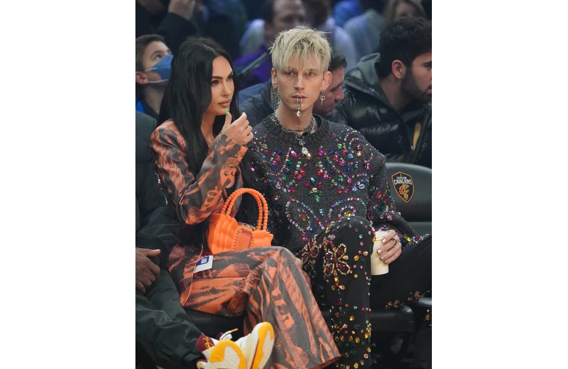Feb 20, 2022; Cleveland, Ohio, USA; Recording artist Machine Gun Kelly with wife and actress Megan Fox before the 2022 NBA All-Star Game at Rocket Mortgage FieldHouse. Mandatory Credit: Kyle Terada-Imagn Images
