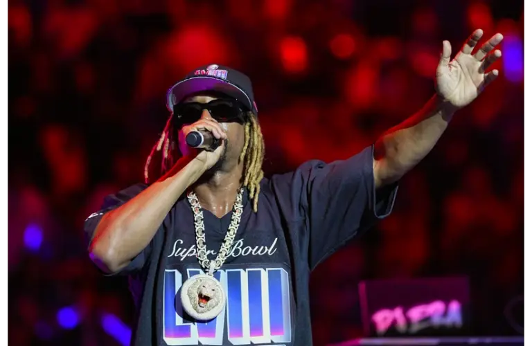 Oct 18, 2024; Lawrence, KS, USA; Recording artist Lil John performs during Late Night in the Phog at Allen Fieldhouse. Mandatory Credit: Jay Biggerstaff-Imagn Images