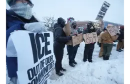 People gather to protest against ICE along W. Market Street in Highland Square in Akron on Jan. 27, 2026. The protest was in reaction to the Jan. 24 death of Alex Pretti, the Minnesota man who was shot by ICE agents. © Mike Cardew / USA TODAY NETWORK via Imagn Images