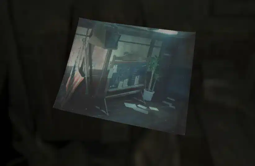 Photo of a black board and a tv in RPD from Resident Evil Requiem