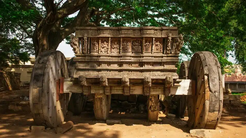 In daily devotion, an ancient chariot is displayed.