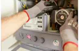kitchen appliance, person is repairing microwave