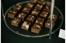 chocolate fudge dessert with gold flakes