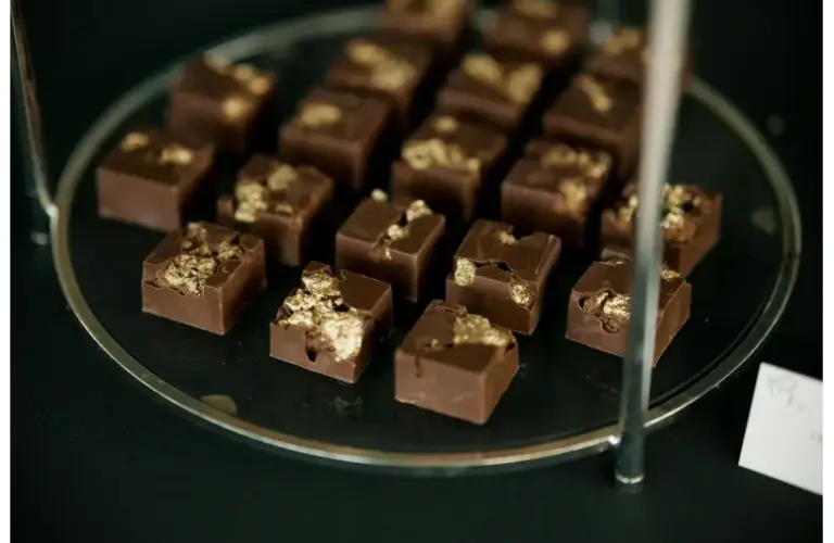 chocolate fudge dessert with gold flakes