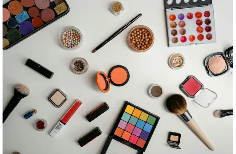 Aesthetic makeup products on a white table
