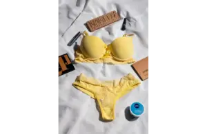a yellow color lingerie with some makeup products