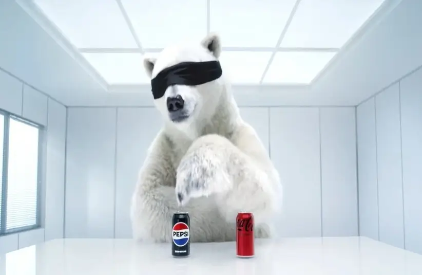 A polar bear takes a taste test in the Super Bowl Pepsi ad.