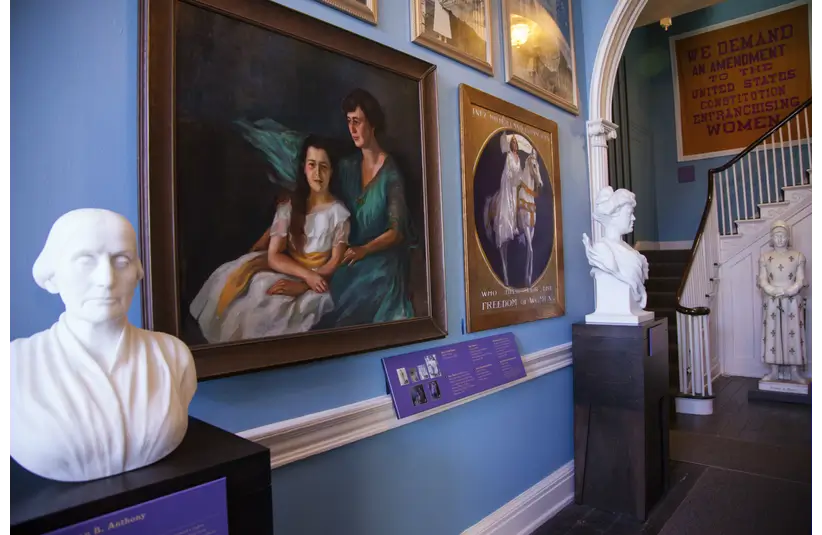 Bust of Susan B. Anthony (left) and Alva Belmont, and statue of Joan of Arc (far right) in front hallway of Belmont-Paul house.