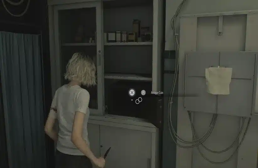 Grace opening the safe in the examination room in Resident Evil Requiem