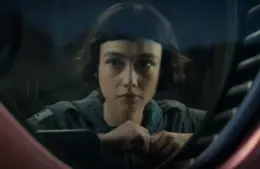 Sydney Chandler as Wendy looks out a window in "Alien Earth"