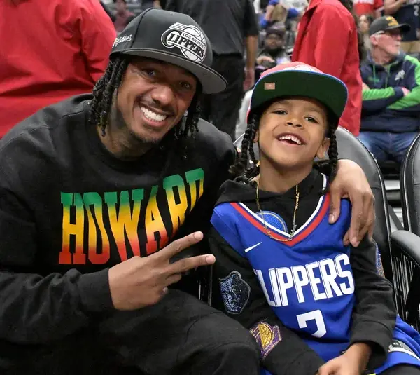 Apr 5, 2024; Los Angeles, California, USA; Comedian and television host Nick Cannon attends the game between the Los Angeles Clippers and the Utah Jazz with his son Golden at Crypto.com Arena. Mandatory Credit: Jayne Kamin-Oncea-Imagn Images
