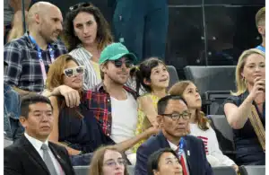 Aug 4, 2024; Paris, France; Eva Mendes and Ryan Gosling attends the second day of gymnastics event finals during the Paris 2024 Olympic Summer Games at Bercy Arena. Mandatory Credit: Jack Gruber-Imagn Images
