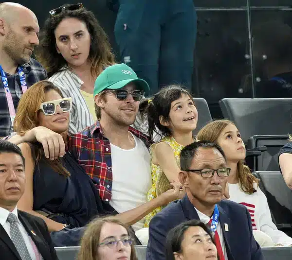Aug 4, 2024; Paris, France; Eva Mendes and Ryan Gosling attends the second day of gymnastics event finals during the Paris 2024 Olympic Summer Games at Bercy Arena. Mandatory Credit: Jack Gruber-Imagn Images