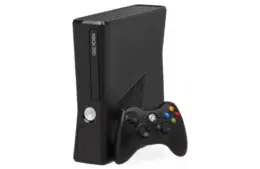 Black Xbox 360 with black Xbox controller leaning against it