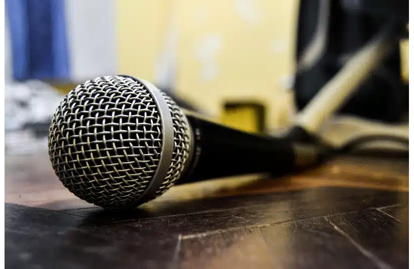 Image of a mic laying on the stage. Wu-Tang Clan's co-founder has passed. Rest in Power, Power.