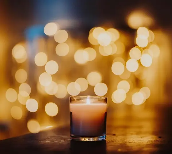 Image of a candle burning in memory of a person lost. Oliver "Power" Grant of the WuTang Clan passed away from cancer.