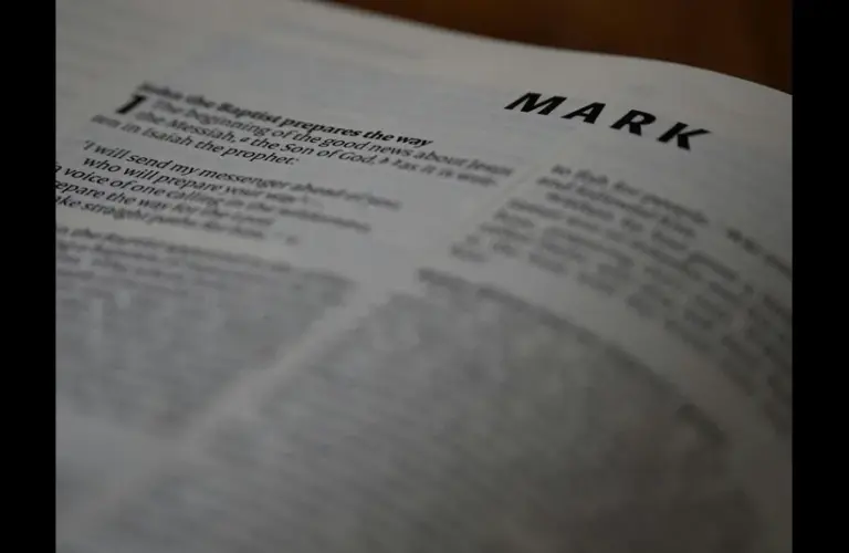 In daily devotion, a Bible is open to Mark.