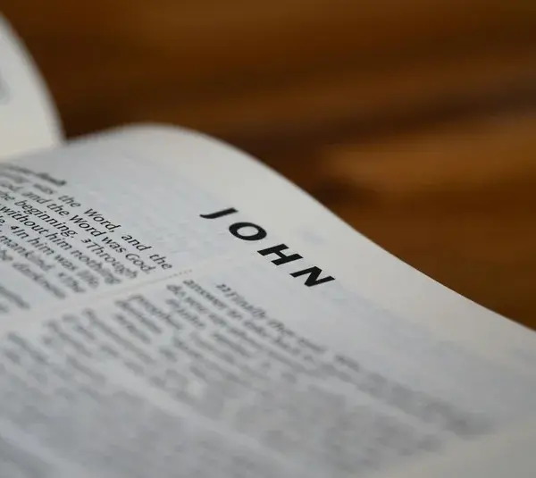 In daily devotion, an open Bible to John.