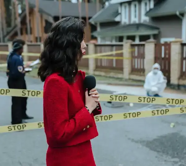 Photo of a reporter at the scene of a crime, similar to the Hawaii crime attack