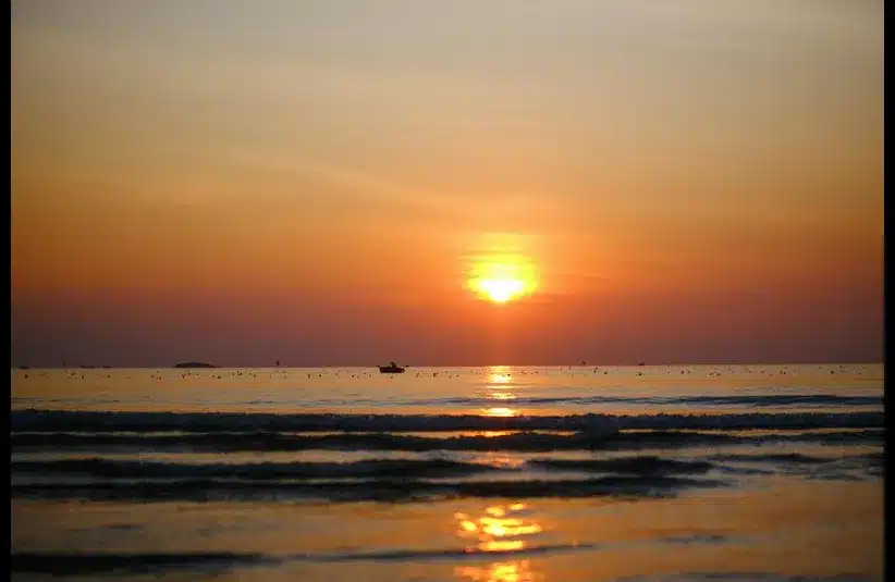 In daily devotion, a sunrise appears in the horizon. 