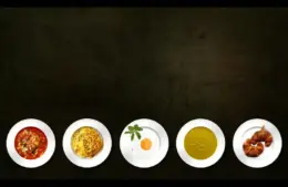 variety of different comfort foods in 5 plates