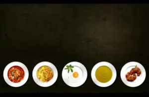 variety of different comfort foods in 5 plates