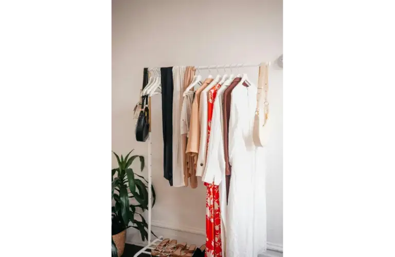 Clothes hanging on a rack representing spring style