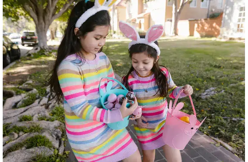 Two girls wearing matching spring outfits