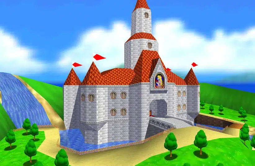 Princess Peach's castle in Mario 54. A grey stone castle with reddish brown roof that has three seen turrets and one tower in the middle surrounded by a moat