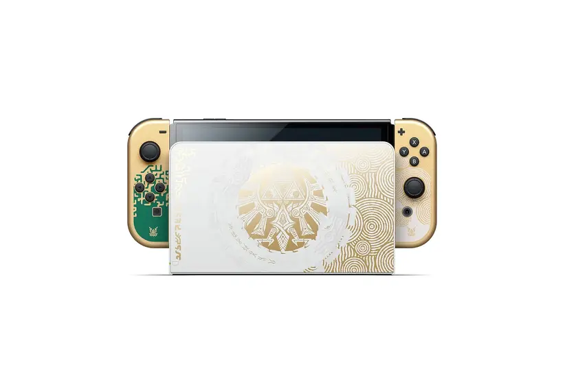 Gold and white Zelda-themed handheld gaming console featuring intricate, mythical-themed symbols on the controllers and base, conveying an elegant and adventurous tone.
