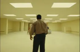 "Backrooms" movie trailer features Clark stumbling into the Backrooms, a subspace with yellow walls, flourescent lights, and off-white carpeting