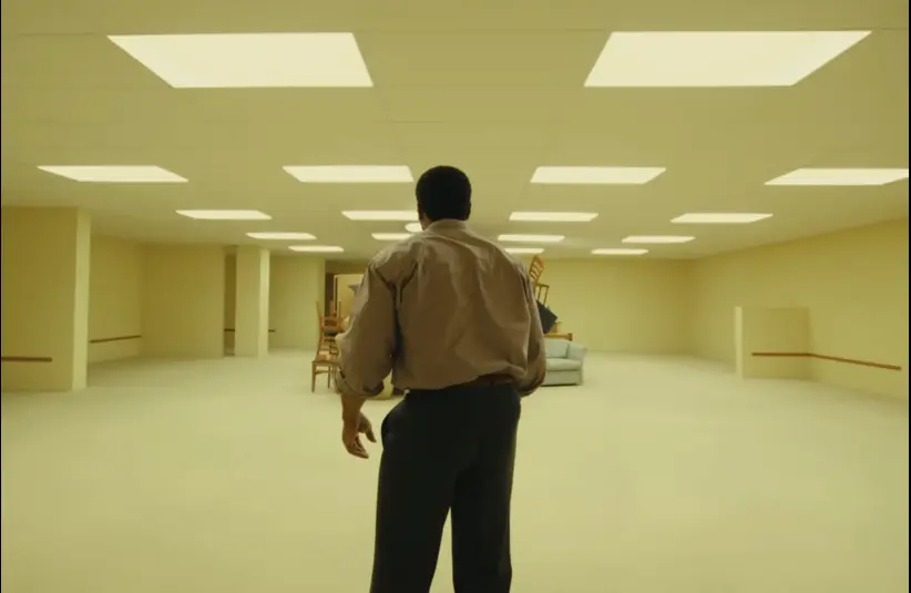 "Backrooms" movie trailer features Clark stumbling into the Backrooms, a subspace with yellow walls, flourescent lights, and off-white carpeting