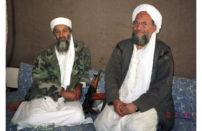  Osama bin Laden sits with his adviser Ayman al-Zawahiri during an interview with Pakistani journalist Hamid Mir.  November 2001 in Kabul.