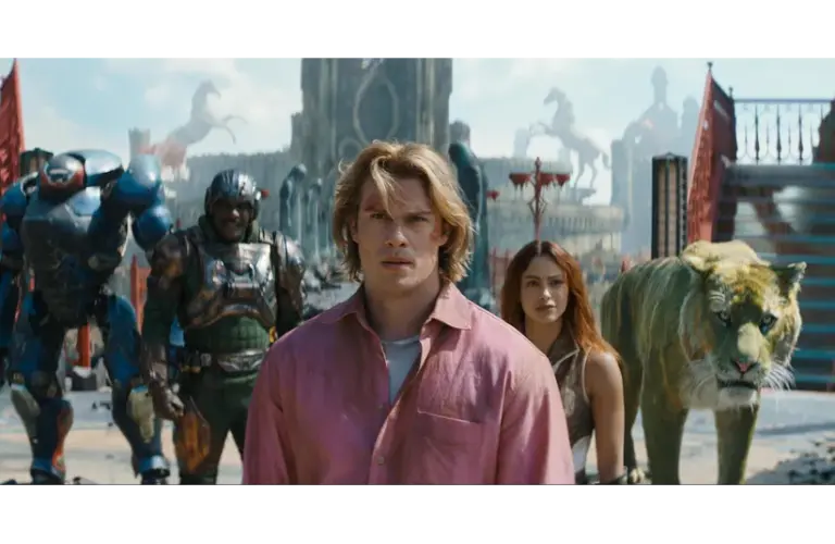 "Masters of the Universe" (2026) casts a group of diverse heroes, including a man in a pink shirt, a woman, a tiger, and armored figures, who stand determined in an ancient, mythic setting.