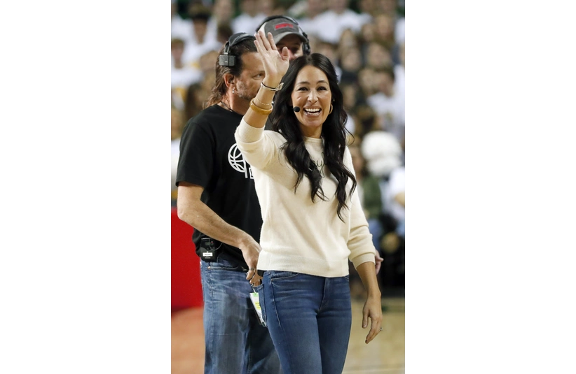 Feb 22, 2020; Waco, Texas, USA; Baylor Bears fan and television personality Joanna Gaines waves to fans before the game against the Kansas Jayhawks at Ferrell Center. Mandatory Credit: Kevin Jairaj-Imagn Images