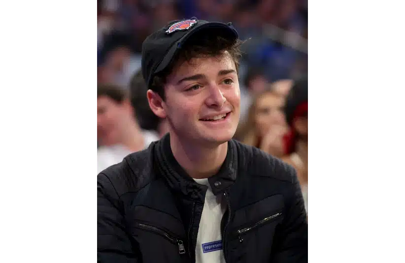 Apr 30, 2023; New York, New York, USA; American actor Noah Schnapp sits court side during the second quarter of game one of the 2023 NBA Eastern Conference semifinal playoffs between the New York Knicks and the Miami Heat at Madison Square Garden. Mandatory Credit: Brad Penner-Imagn Images