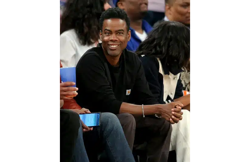 May 2, 2023; New York, New York, USA; American comedian Chris Rock sits court side during the second quarter of game two of the 2023 NBA Eastern Conference semifinal playoffs between the New York Knicks and the Miami Heat at Madison Square Garden. Mandatory Credit: Brad Penner-Imagn Images