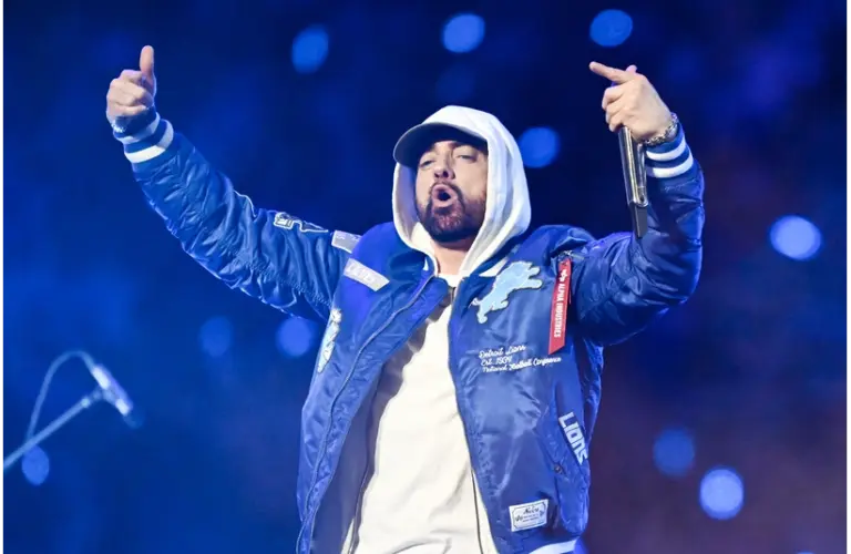Nov 27, 2025; Detroit, Michigan, USA; Eminem performs during halftime of the game between the Green Bay Packers and Detroit Lions at Ford Field. Mandatory Credit: Lon Horwedel-Imagn Images
