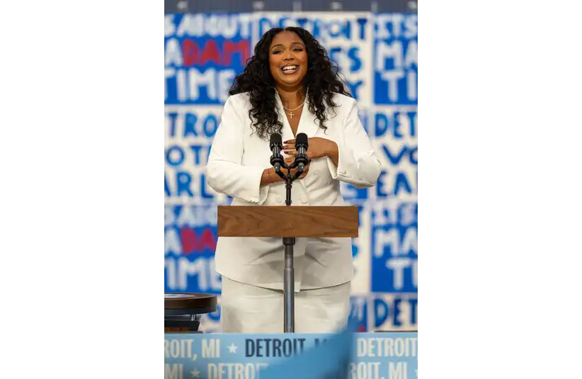Melissa Viviane Jefferson, aka Lizzo, gives a speech before Vice President and presidential candidate Kamala Harris at Western International High School in Detroit on Saturday, Oct. 19, 2024. © David Rodriguez Munoz / USA TODAY NETWORK via Imagn Images