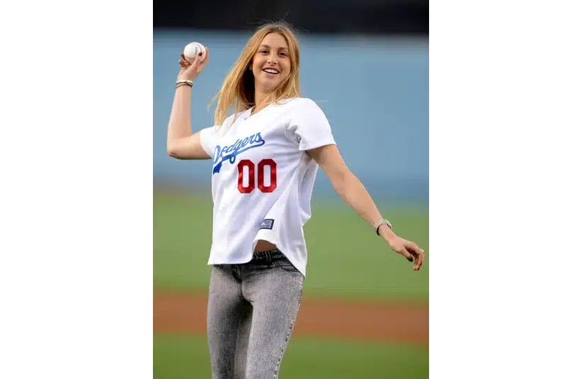 May 19, 2009; Los Angeles, CA, USA; Television personality Whitney Port throws out the ceremonial first pitch before the game between the New York Mets and Los Angeles Dodgers at Dodger Stadium. Mandatory Credit: Kirby Lee/Image of Sport-Imagn Images