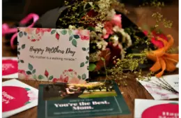 Assorted items on a table in the theme of Mother's Day