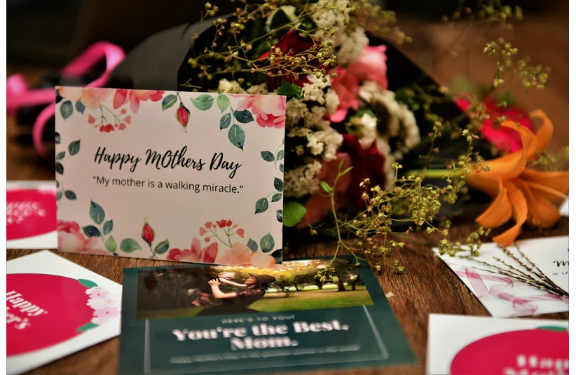 Assorted items on a table in the theme of Mother's Day