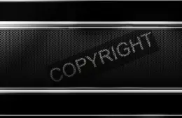 A metallic black background with a honeycomb pattern, featuring the word "COPYRIGHT" in bold, dotted letters tilted diagonally across the center.