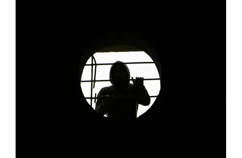 In daily devotional, a thief is shown trying to gain access through a window.