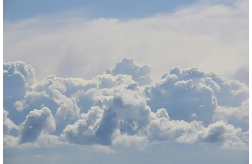 In daily devotion, the heavens are shown with many, puffy clouds.