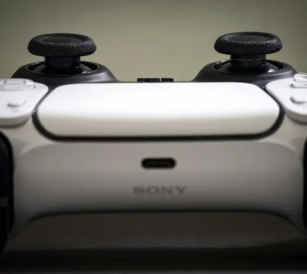 A close up image of a Sony PlayStation 5 DualSense controller