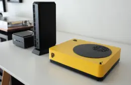Playnix console on a table next to a router